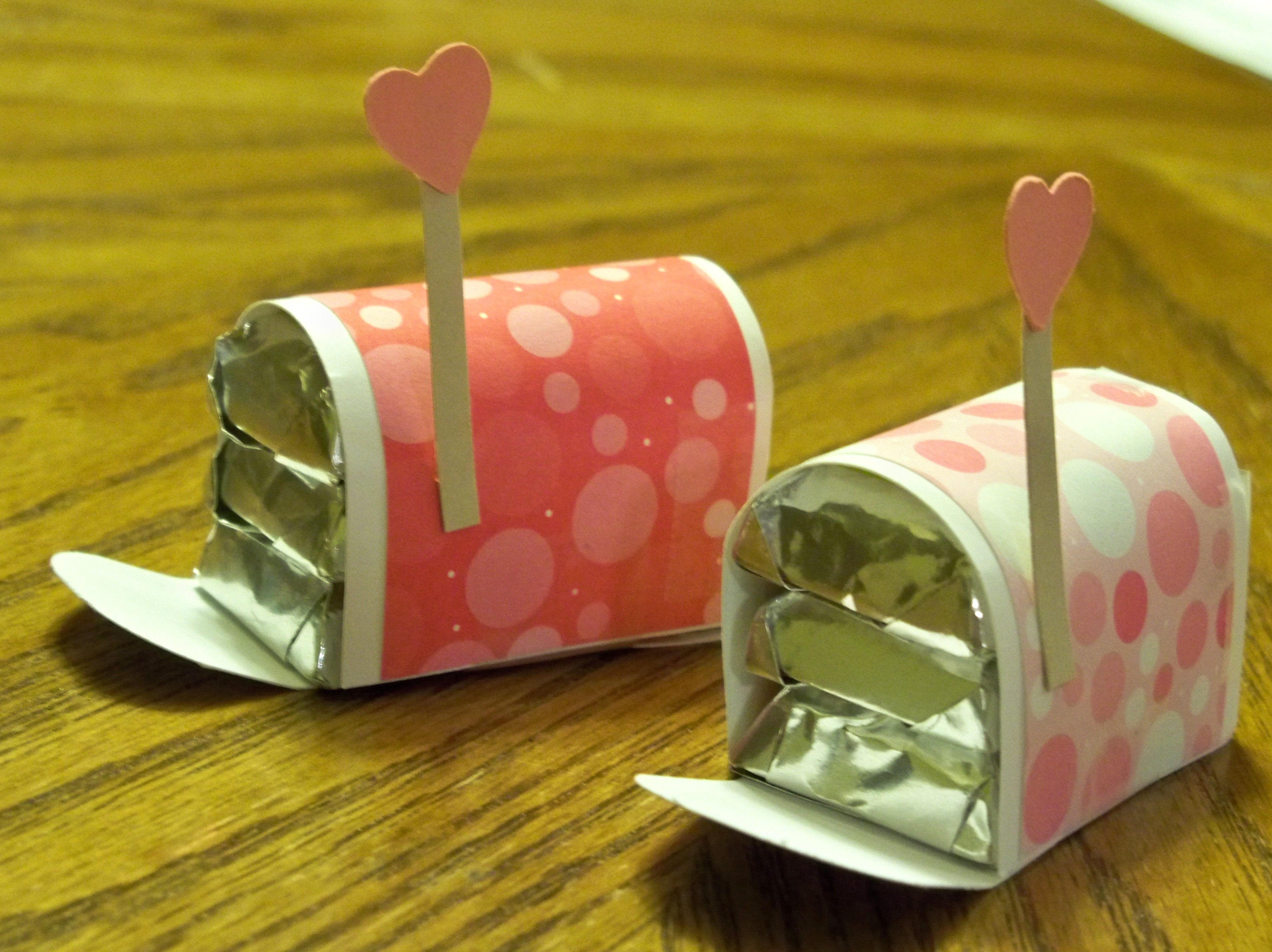 These adorable little paper mailboxes hold 3 Hershey's Miniatures.